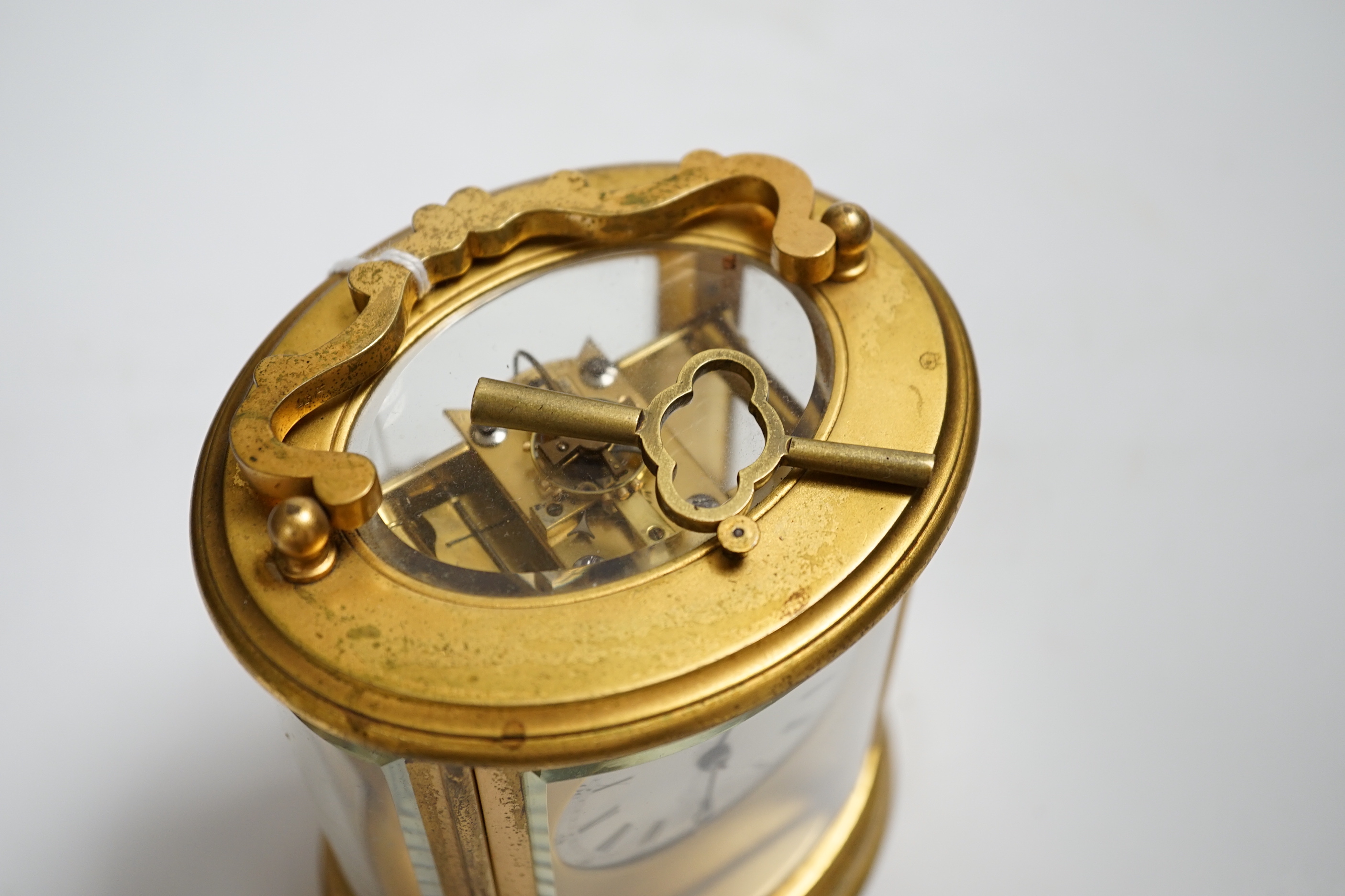 A Drocourt hour-repeating oval carriage clock, striking on a coiled gong, 13cm